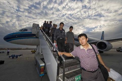 192 Chinese rescued from flood-hit Pakistan arrive home
