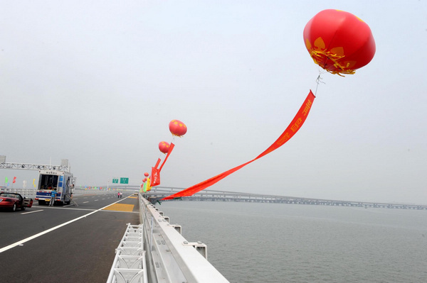 China opens world's longest sea bridge