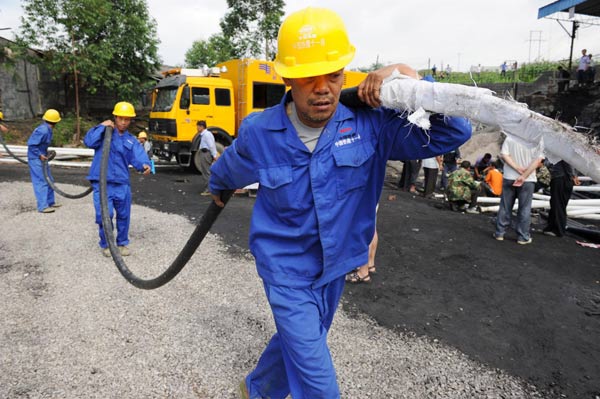 Flood continues at SW China colliery; 23 trapped