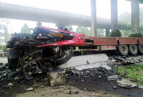 Truck driver injured in bridge cave-in