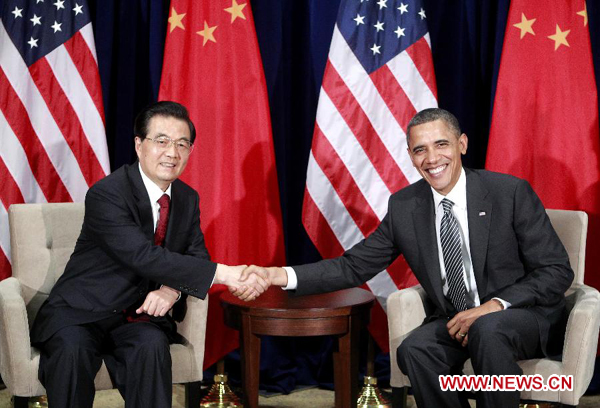 Hu, Obama meet in Hawaii on bilateral ties