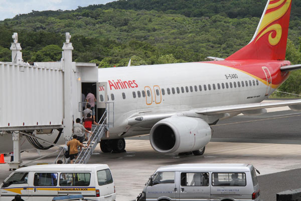 Chinese fishermen detained in Palau fly home