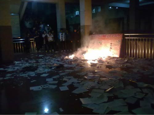 School officials dismissed after book burning