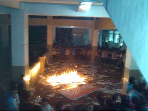 School officials dismissed after book burning