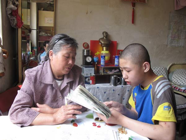 Grandma returns to school, to teach love