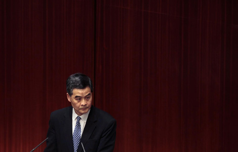 HK chief apologizes for property works