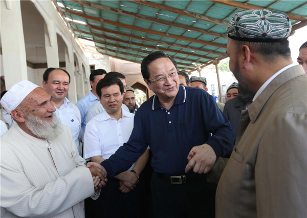Top advisor stresses curbing extremism in Xinjiang