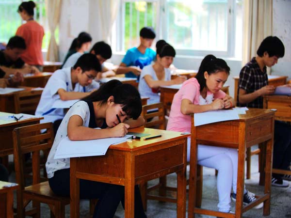 World's largest exam undergoing amid downpours