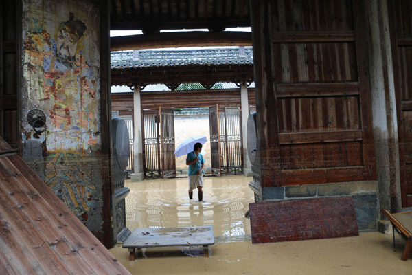 Rain-triggered floods kill 4 in E China