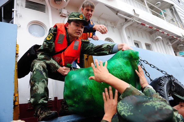 Supplies being delivered to Russian cargo ship