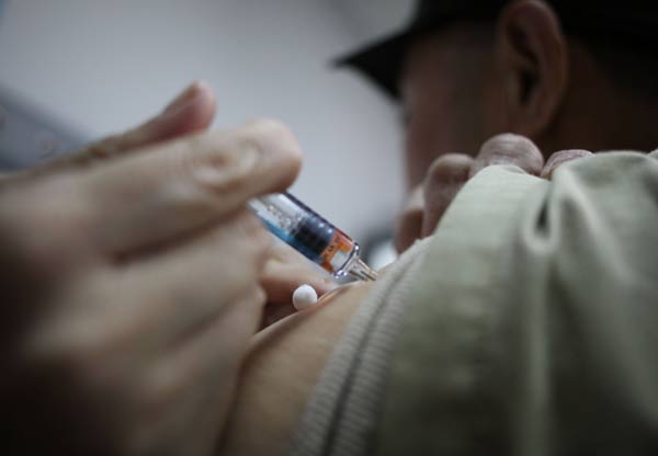 Staggered flu shot plan best, study says