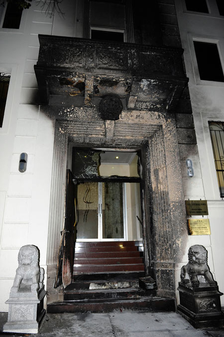 China urges US to ensure safety following consulate arson attack
