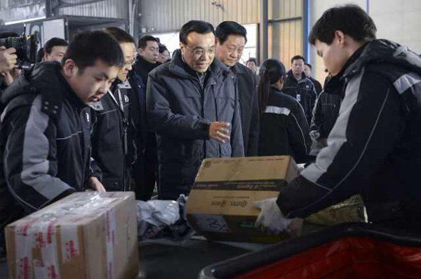 Go global, Premier Li tells domestic courier