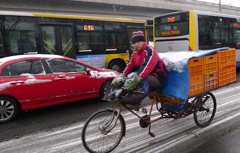 Late-arriving snowfall quenches thirst of Beijing