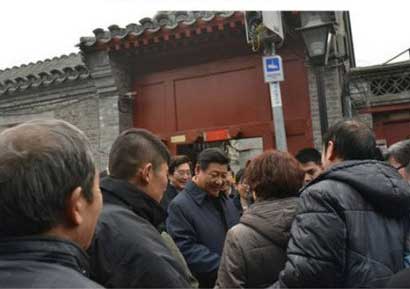 Xi pops in to Beijing's popular <EM>hutong</EM>