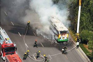 At least five killed in SW China bus fire