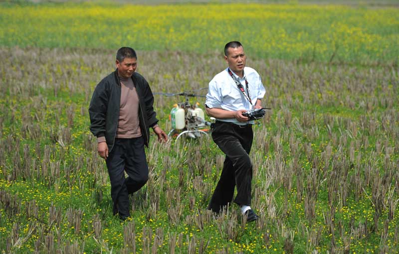 Farmer builds own drones to spray crops