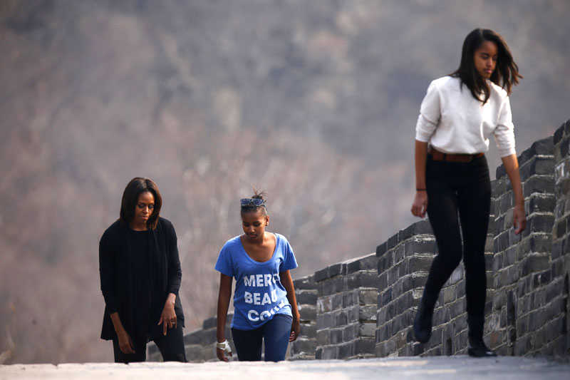 Obamas climb Great Wall after lunch of trout