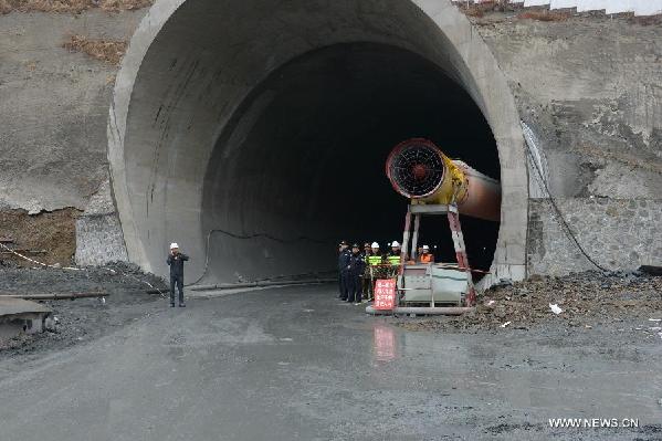 All 12 survive tunnel collapse