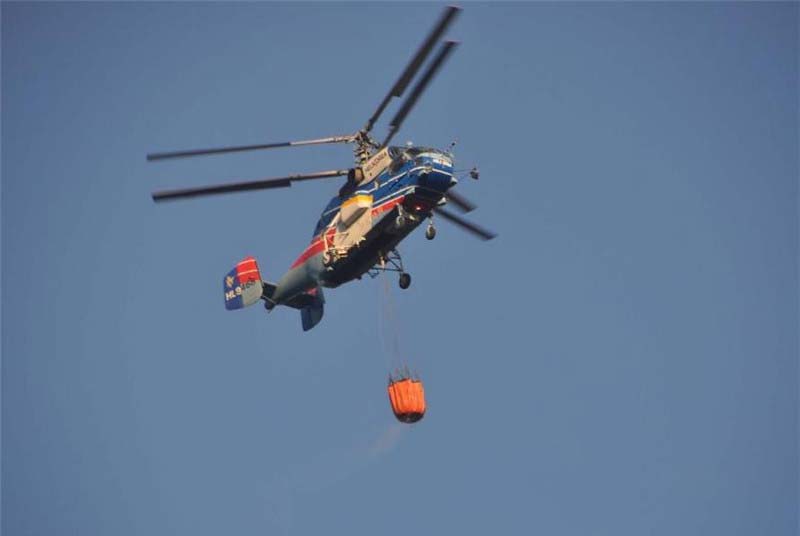 Forest fire breaks out in SW China