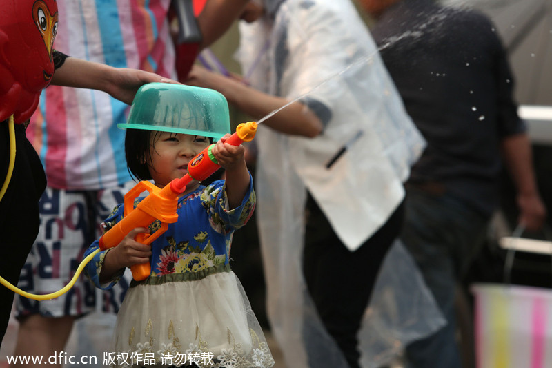 Thousands revel in the Songkran Festival water spree