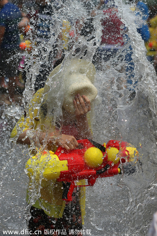 Thousands revel in the Songkran Festival water spree