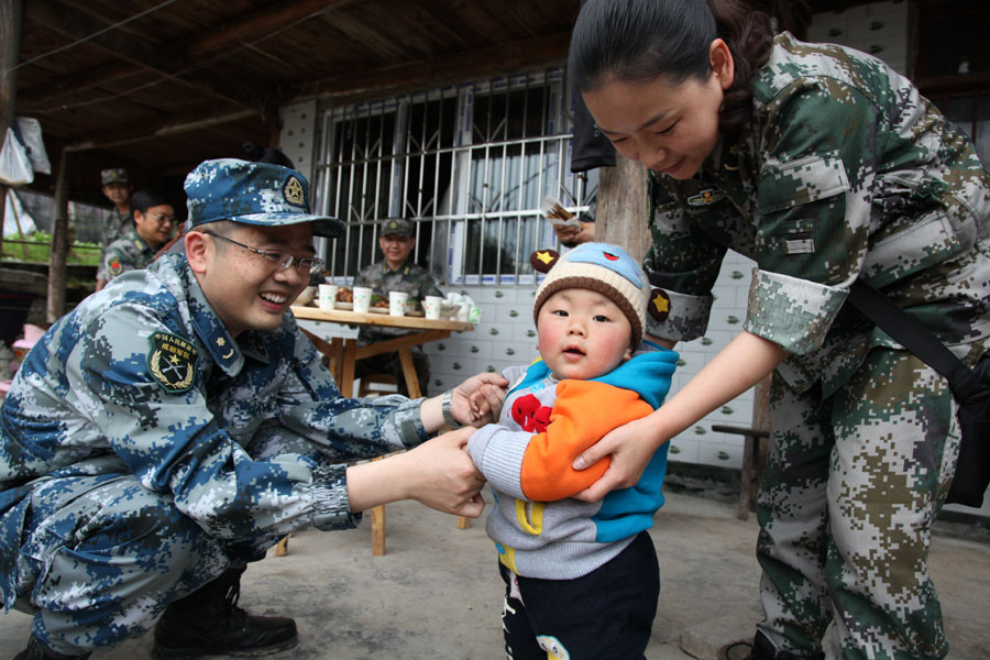 Rescuers celebrate first birthday of 'quake babies'