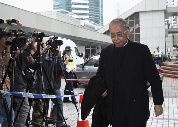 HK tycoons, former senior official stand trial for bribery