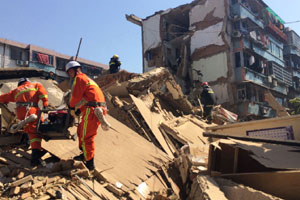 Wall collapse killed 18 in E China