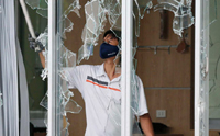 Riot-hit Chinese workers return from Vietnam