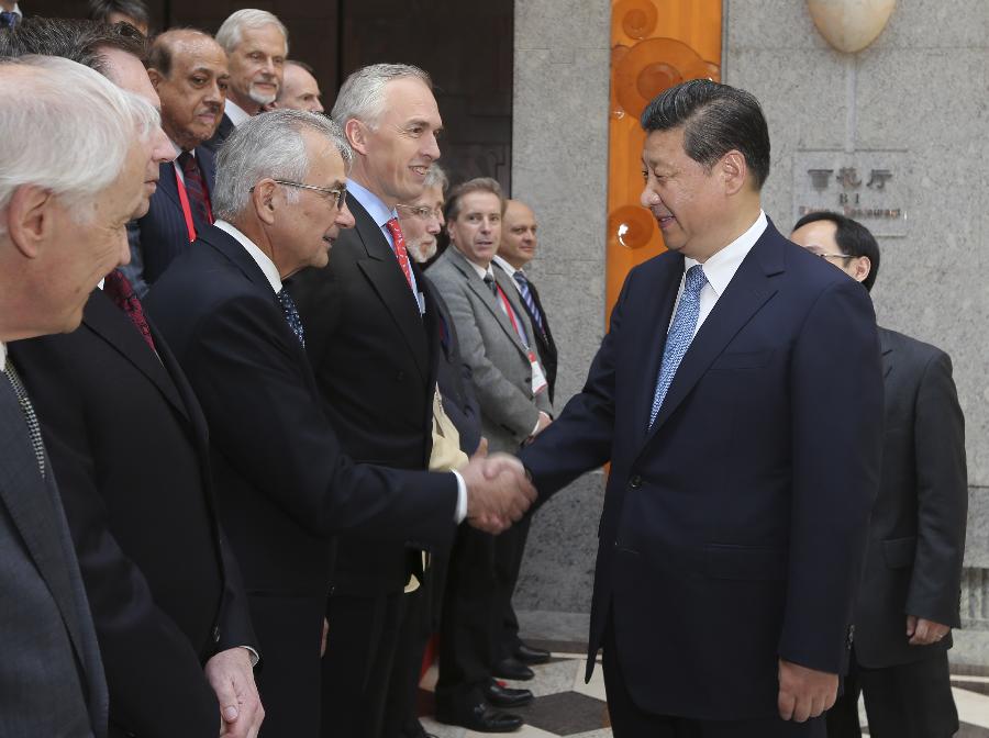 Xi takes note of advice by foreign experts