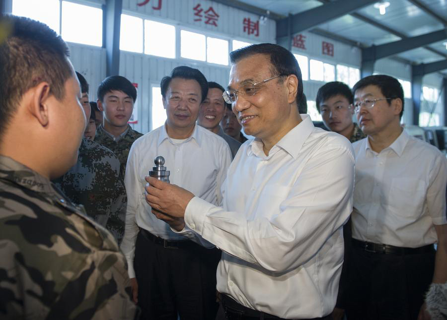 Premier Li urges sustainable development, better livelihood