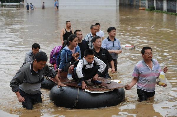 Eight dead as downpours batter south China