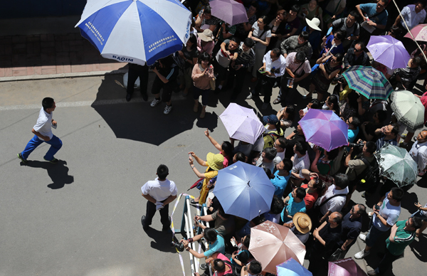 Nearly 10 million take <EM>gaokao</EM>