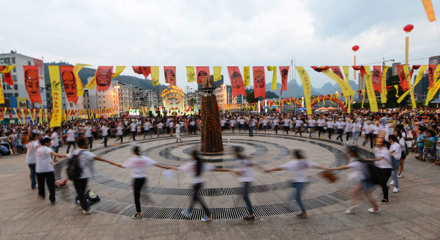 Nuo Dance performed in Fenlong Festival in Hechi, S China