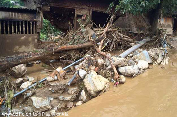 Mountain flash flood in SW China kills five