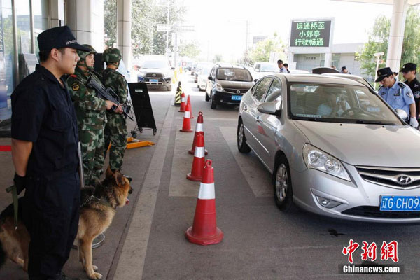 Beijing tightens security for APEC