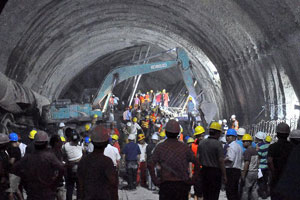 Rescuers save 3 trapped in collapsed building