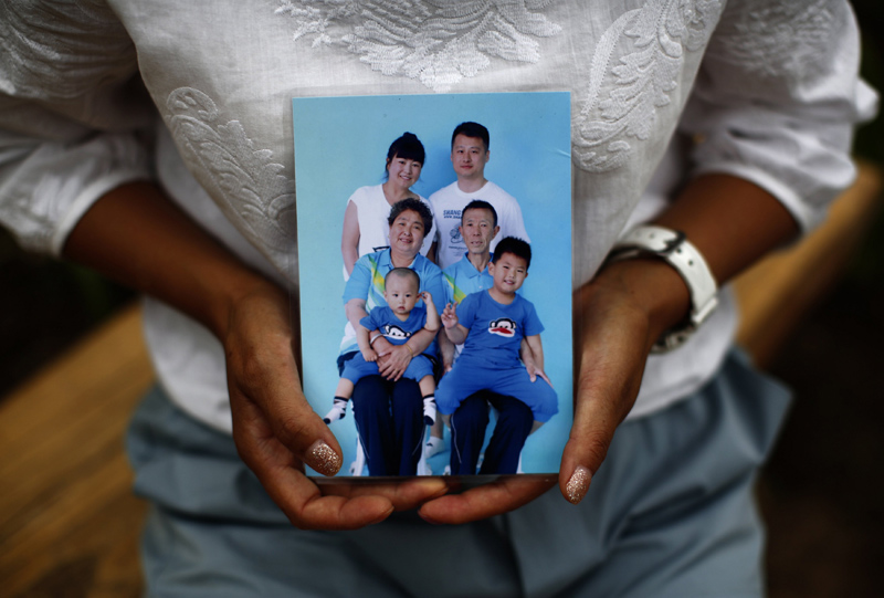 Families find comfort in MH370 passengers' mementos