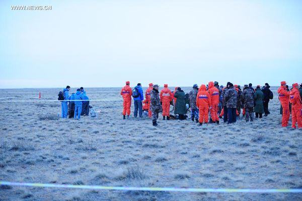 China's unmanned lunar orbiter returns home