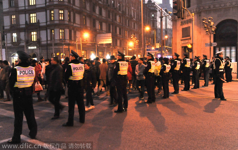 Shanghai beefs up security around fatal stampede site