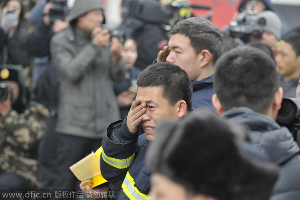 Firefighters' deaths in building collapse prompt debate