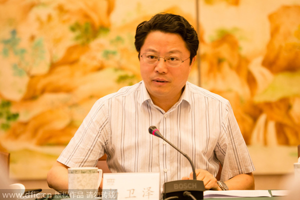 Ex-Wuxi chief linked to Zhou