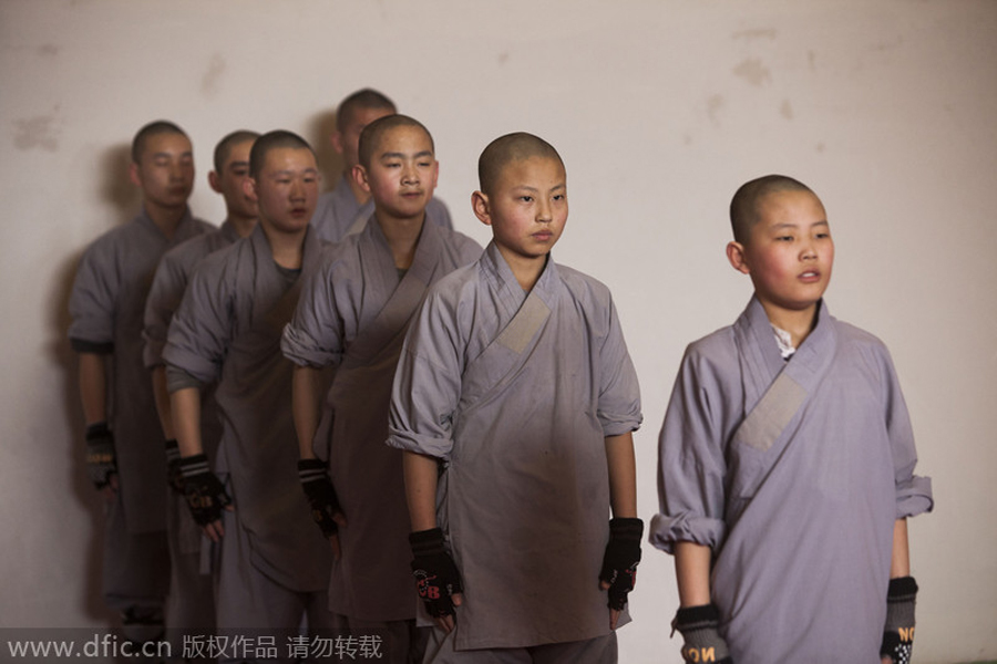 Buddhist monk breaks brick in kung fu