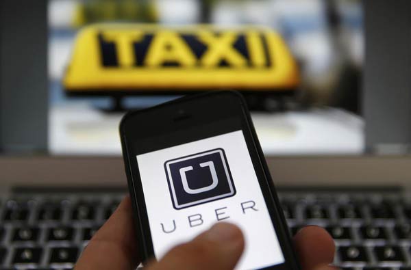 Uber office raided in crackdown on unlicensed taxi