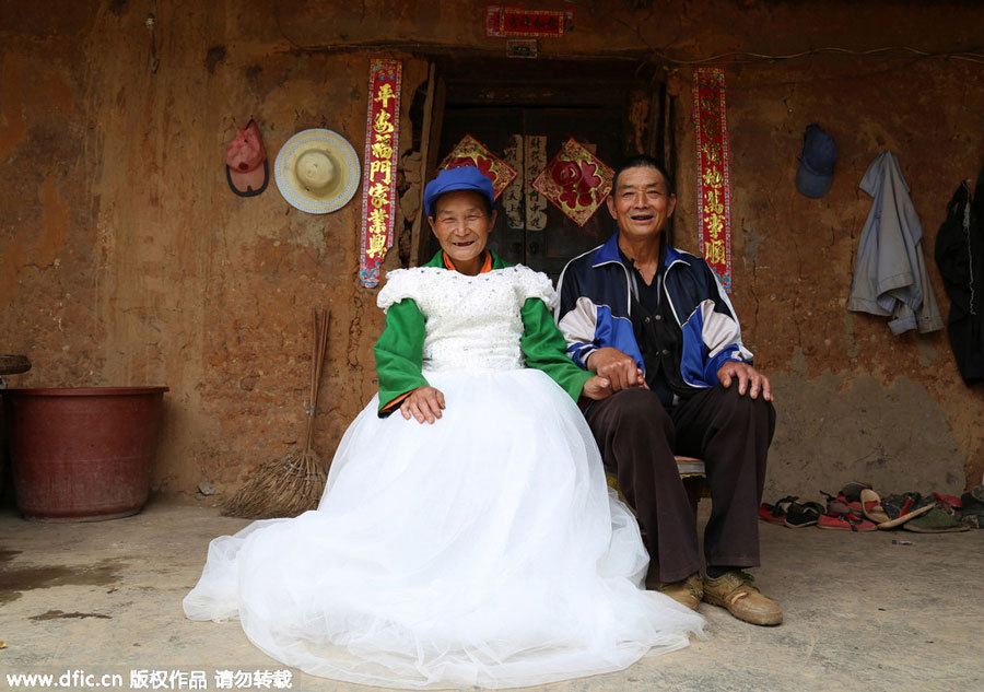 Young photographer takes family photos for mountain-dwellers