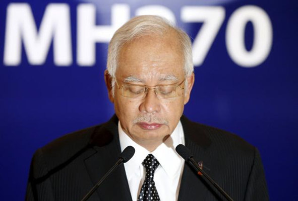 Chinese FM calls for continued MH370 search