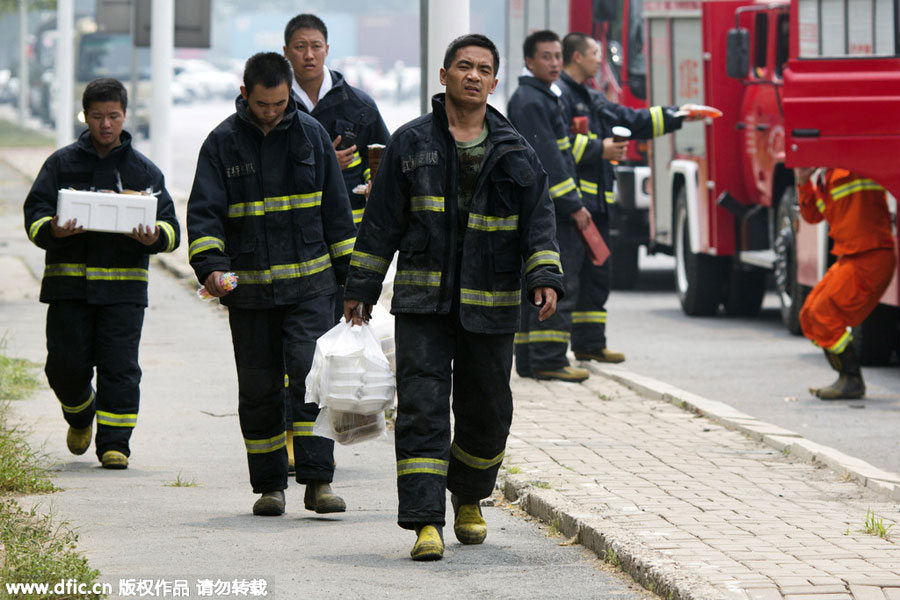 Firefighters: a steady presence at Tianjin blast site