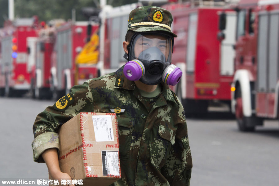 Firefighters: a steady presence at Tianjin blast site