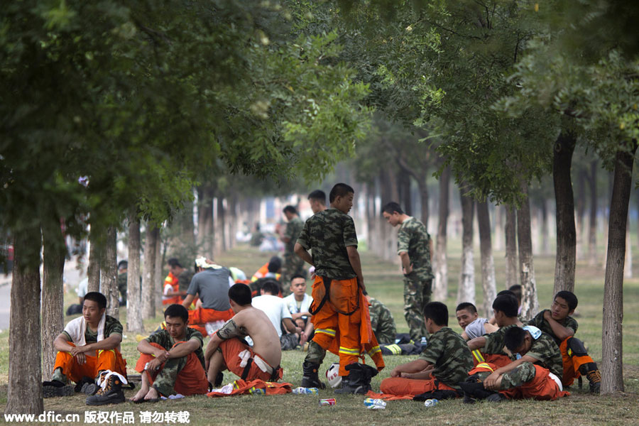 Firefighters: a steady presence at Tianjin blast site